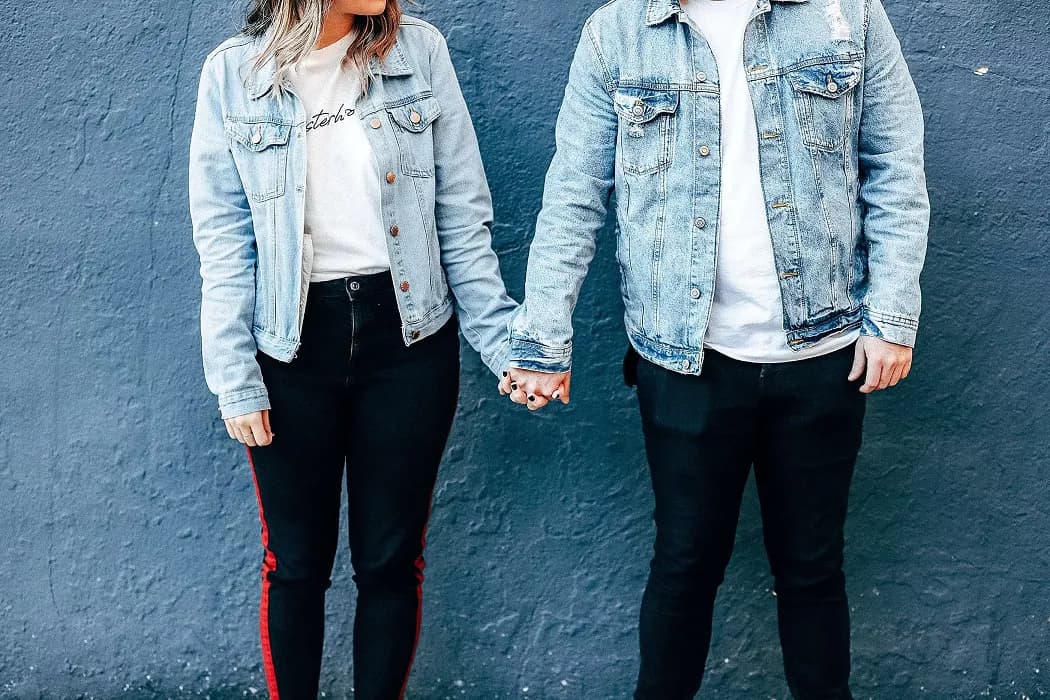 Couple hold hands