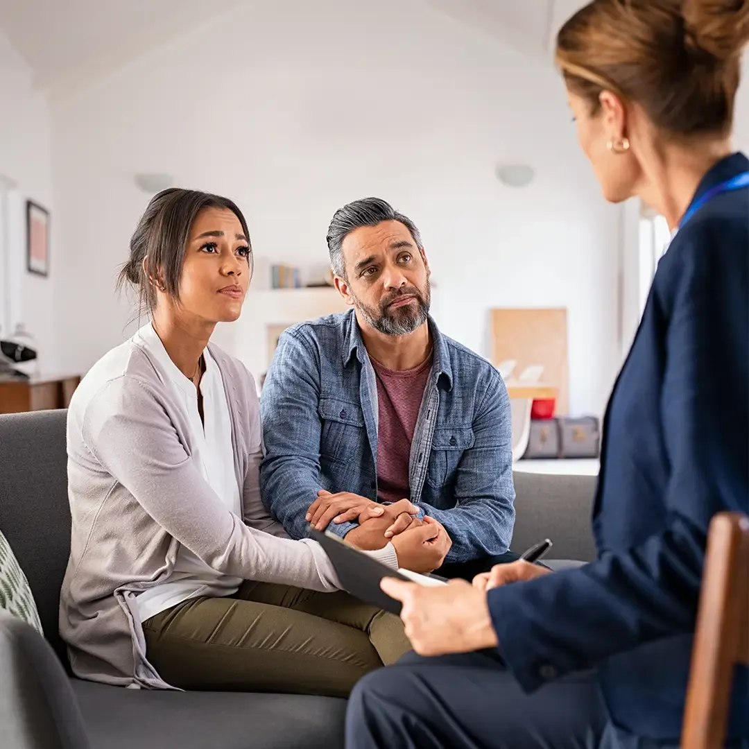 Couple receiving emotional support and fertility counseling