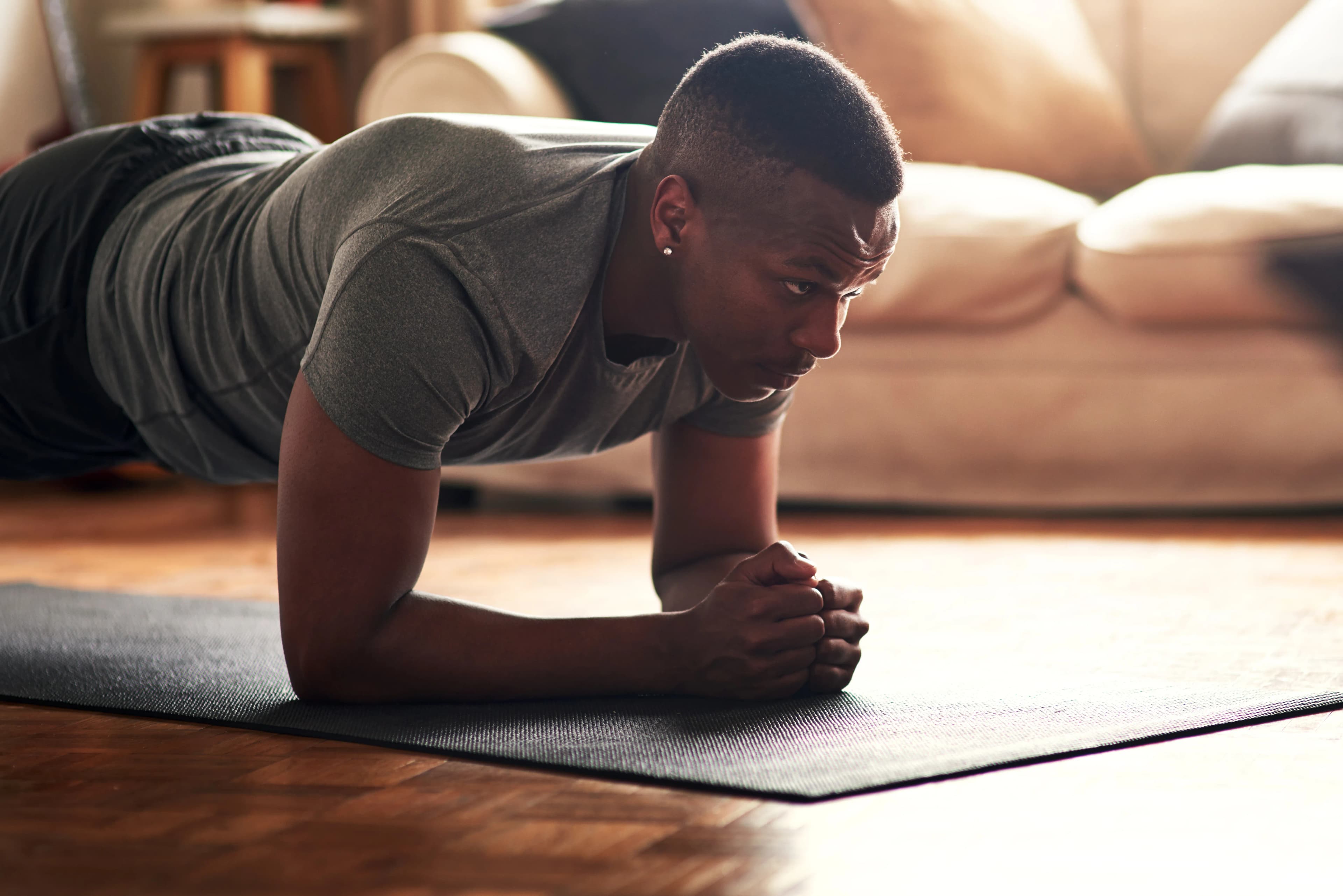 A young man doing the plank